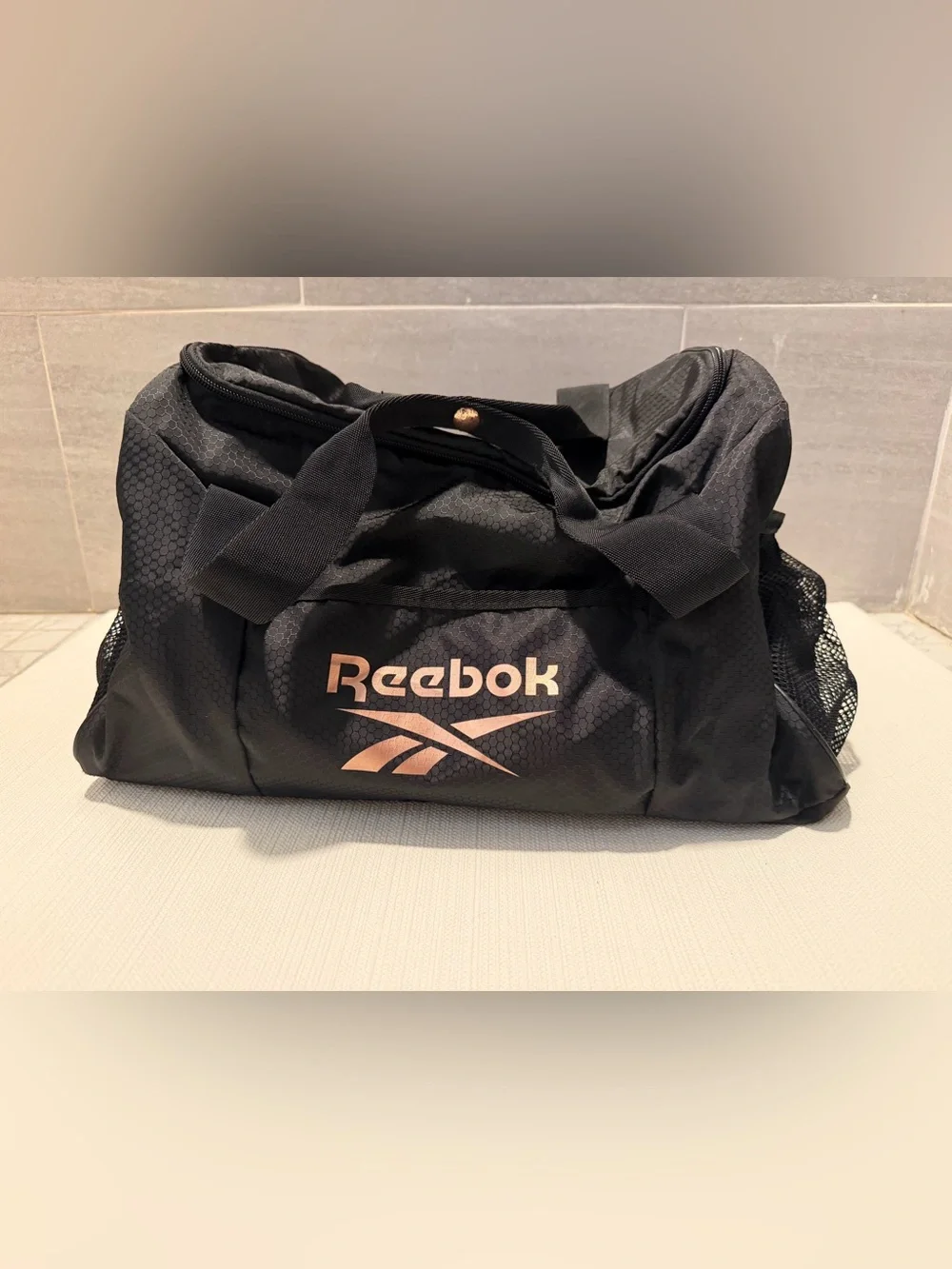 Reebok Black Duffel Bag with Rose Gold Logo Accents